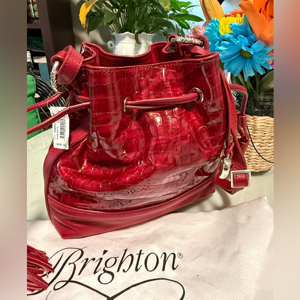Brighton Christa Glossy Red Bucket Bag NWT
Size and details in photos 
Red